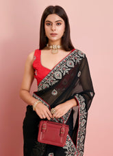 Delicate looking saree in black colour